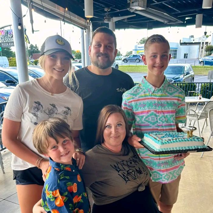Brian with his wife and three kids